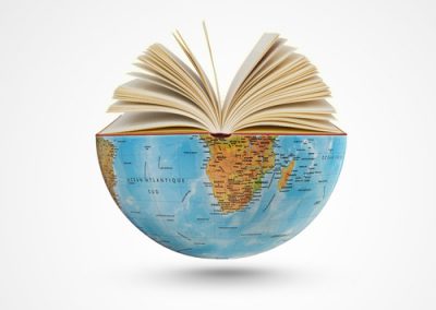 book open on top of globe